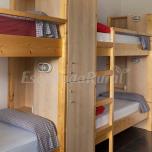 Dormitorio compartido baño privado