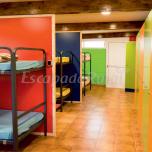 Cama en habitación compartida