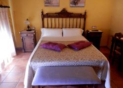 Habitación doble con cama de m...